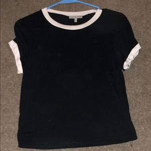 Small black and white T-shirt.